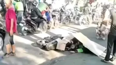 Elakkan Pintu Mobil, Ojol Meninggal Terlindas di Jalan Yos Sudarso